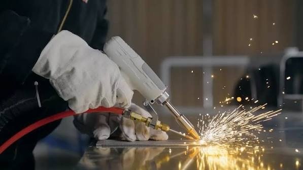 Laser welding seam close-up sparks